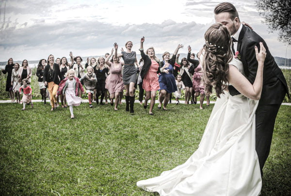 Wedding couple with joyful guests at wedding | MyWayPhotos-wedding-photography